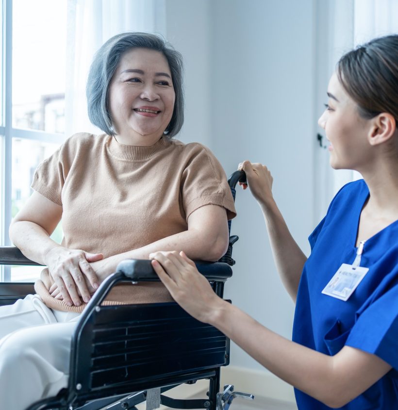 asian-nurse-take-care-senior-woman-on-wheelchair-at-nursing-home-care-.jpg